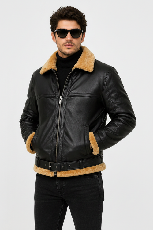 Man wearing a black leather jacket with brown fur trim on a white background