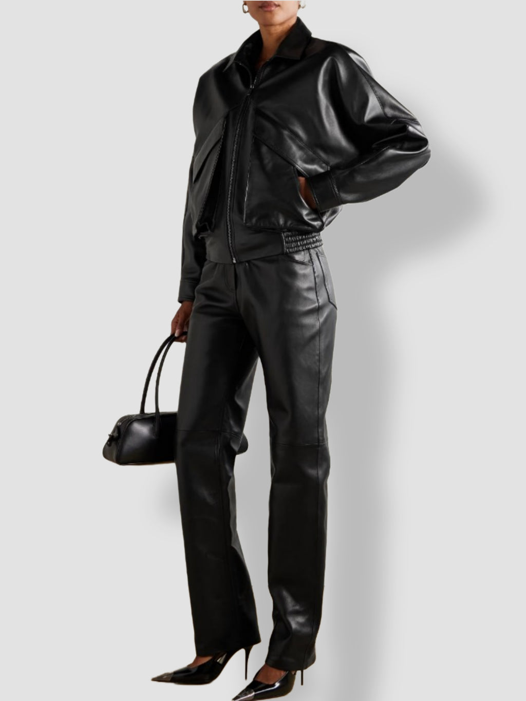 Black genuine leather bomber jacket – bold panel detail side view women's outerwear
