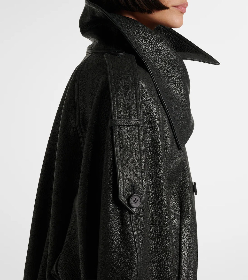 Black genuine leather double breasted coat – high funnel neck side view women's outerwear
