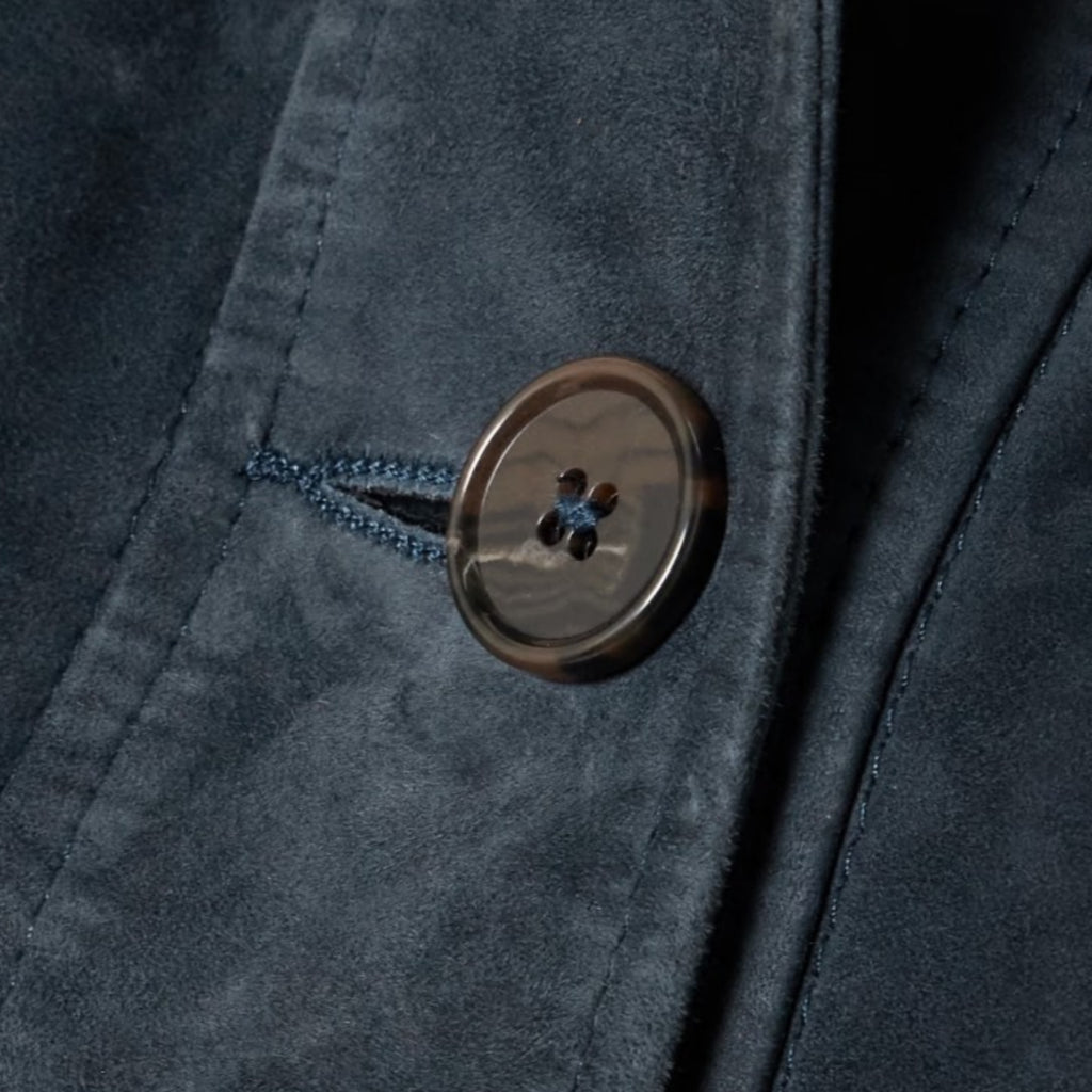 Premium navy blue suede leather jacket detail – handcrafted button-front women's coat
