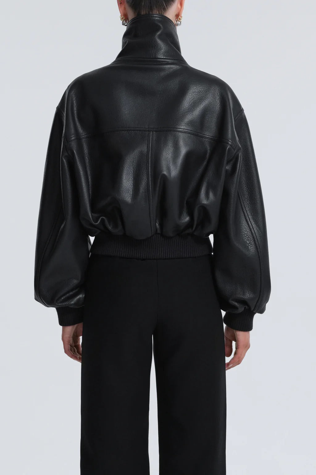 Women's black genuine leather cropped bomber – high neck modern fit back view
