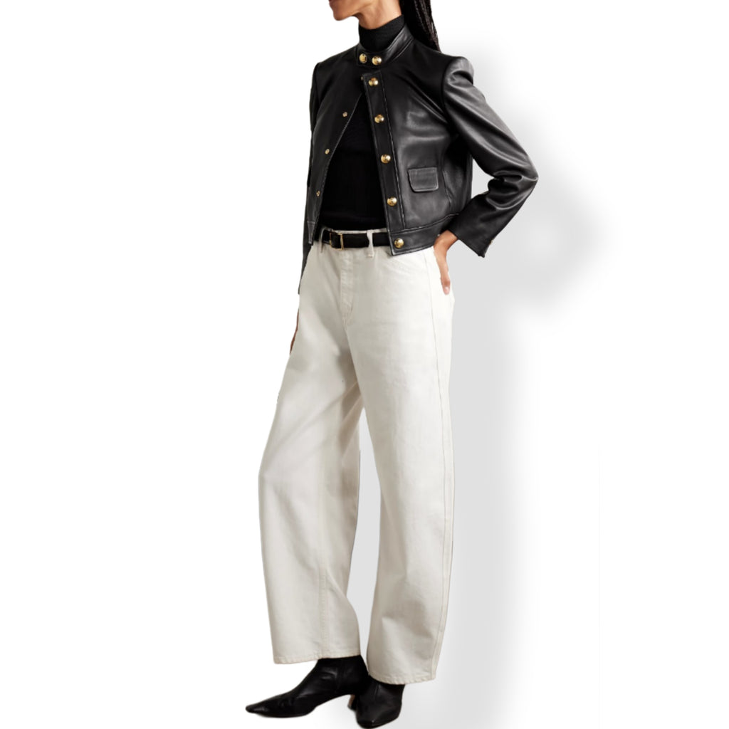 Woman wearing luxury black cropped leather jacket